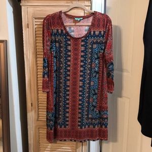 Nostalgia, beautiful colors in this dress, teal, rust, taupe, black